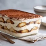 Easiest no bake tiramisu with creamy layers and cocoa topping